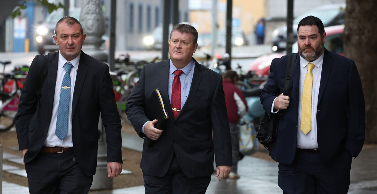 Detective Sergeant Michael Bourke, Det Insp Donal Donohue, and Det Gda Emmett Dunphy, all from Waterford Garda Station, arriving at the Criminal Courts of Justice in Dublin on Friday. Picture: IrishPhotoDesk.ie