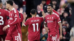 <p>Ryan Gravenberch (right) celebrates with team-mates after scoring the second. Pic: Peter Byrne/PA</p>