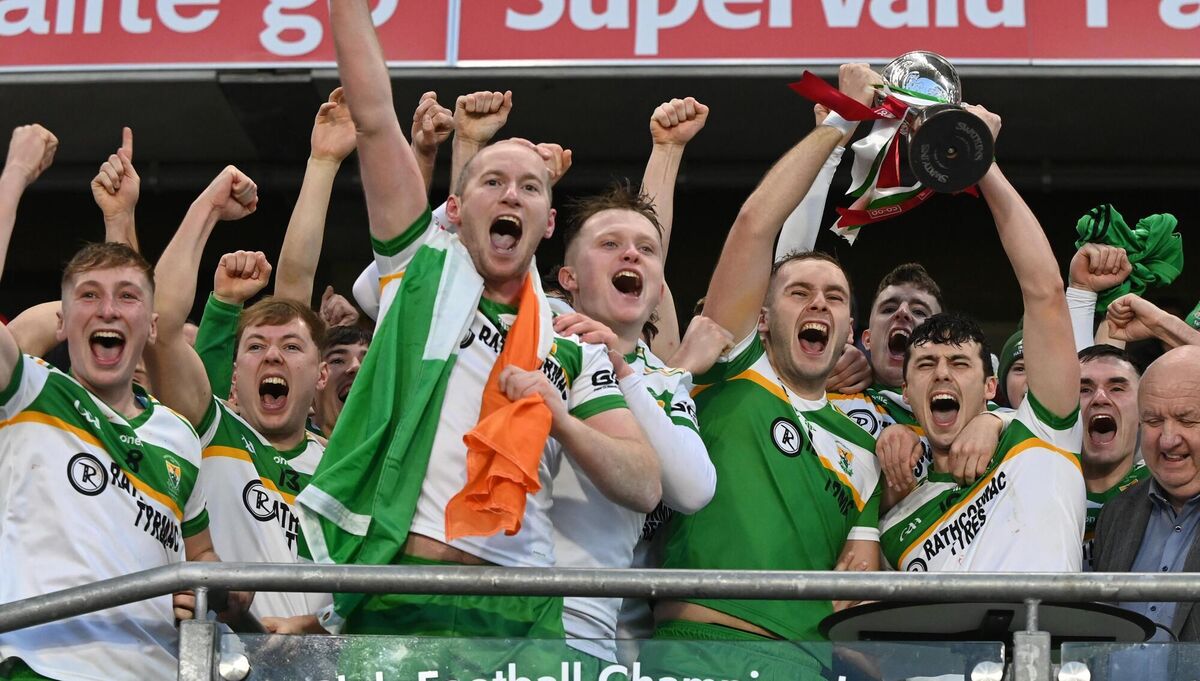 Bride Rovers' joint captains Cian Hogan and Conleith Ryan raises the Jim Forbes cup after defeating Castleyons in Cork's SAHC final replay. Pic: Eddie O'Hare