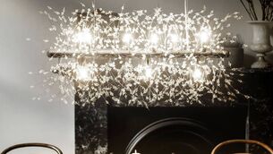 <p>Chandelier fire in a modern fitting? This dynamic Dandelion Starburst nine-light piece sets modern materials on a rectangular canopy; Etta Avenue design, from €199.99, Wayfair.</p>