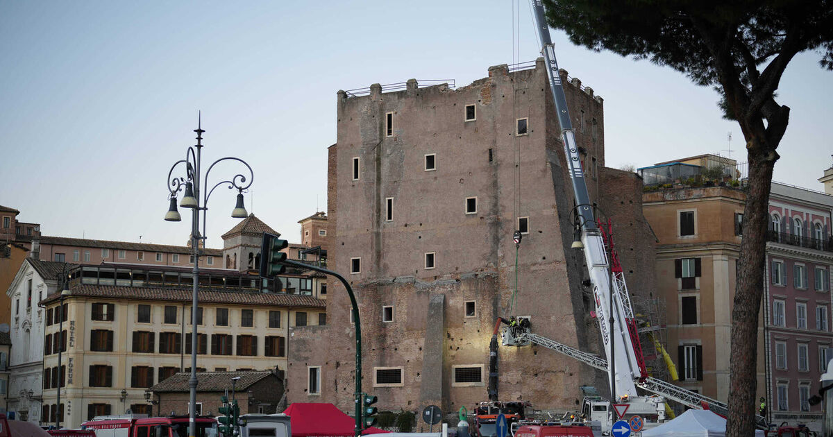 Bid to reach worker trapped in medieval tower that partially collapsed in ...