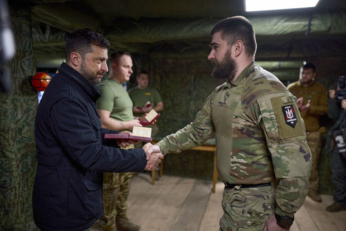 Zelenskyy, left, awards servicemen near the frontline city. Picture: Ukrainian Presidential Press Office/AP Zelenskyy, left, awards servicemen near the frontline city. Picture: Ukrainian Presidential Press Office/AP