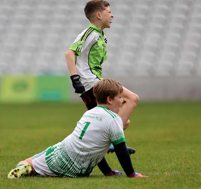 Ciaran O'Brien, Upper Glanmire, celebrates scoring his teams second goal with Beau Foley, Clonpriest goalkeeper. Pic: Jim Coughlan. Ciaran O'Brien, Upper Glanmire, celebrates scoring his teams second goal with Beau Foley, Clonpriest goalkeeper. Pic: Jim Coughlan.