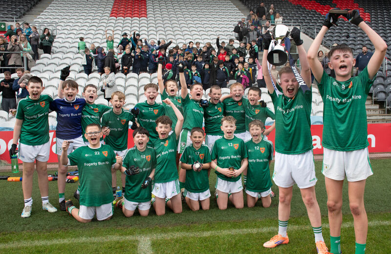 Killeagh joint captains Charlie Landers and Diarmuid Murphy celebrate with their team as they capture the Allianz Sciath na Scol DF4 trophy in Parc Ui Chaoimh.. Picture: Howard Crowdy Killeagh joint captains Charlie Landers and Diarmuid Murphy celebrate with their team as they capture the Allianz Sciath na Scol DF4 trophy in Parc Ui Chaoimh.. Picture: Howard Crowdy