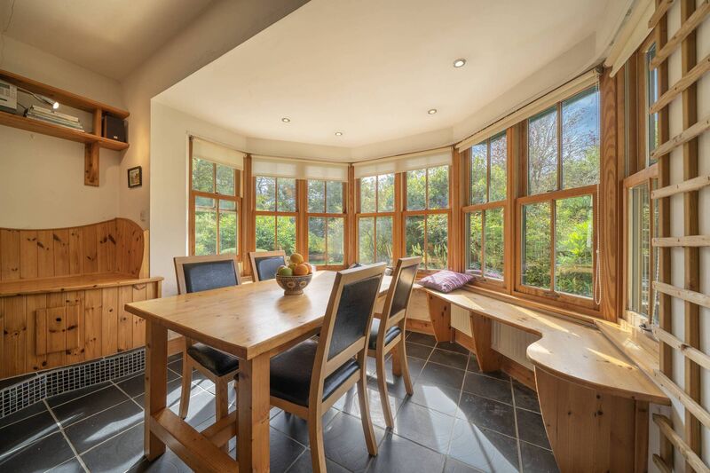 Dining in the big bay window Dining in the big bay window