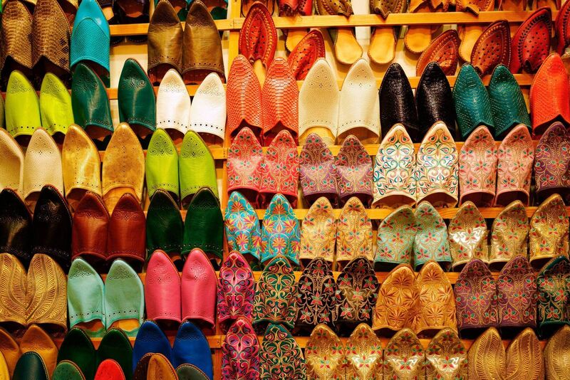 Colourful bobouches, traditional Moroccan shoes, on sale at the souk