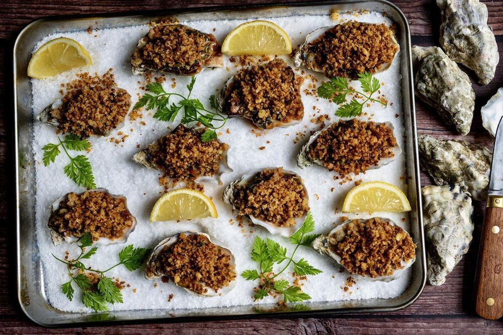 Golden baked oysters with creamy chard