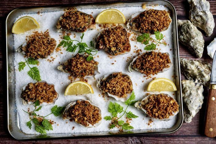 Golden baked oysters with creamy chard