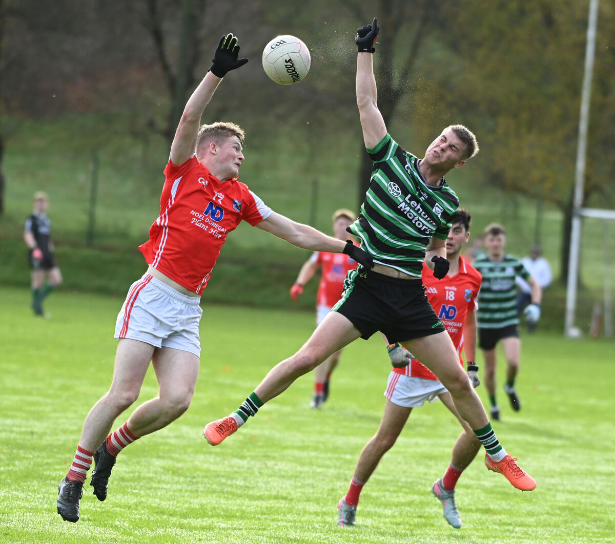 Beara's Darren Harrington and Douglas' Jack Cunningham go high for the ball. Pic: Eddie O'Hare