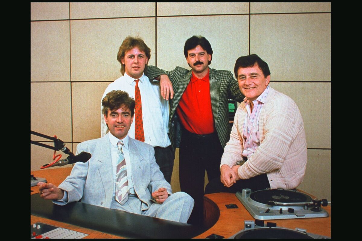 DJs on RTÉ Radio 2 (later 2FM) in 1986: Jimmy Greeley, front, with Ian Dempsey, Marty Whelan, and Larry Gogan. The station was launched seven years earlier with the slogan 'Cominatcha' — but without Gareth O'Callaghan. Picture: RTÉ Archive
