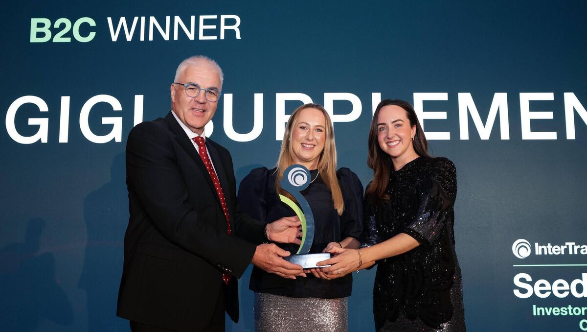 Jennie Haire and Lisa Hughes of Gigi Supplements accept their B2C prize from InterTradeIreland's Richard Kennedy.