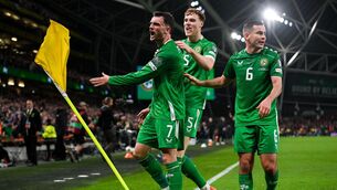 <p>FLYING THE FLAG: Troy Parrott celebrates with his teammates after scoring. Pic: Stephen McCarthy/Sportsfile</p>