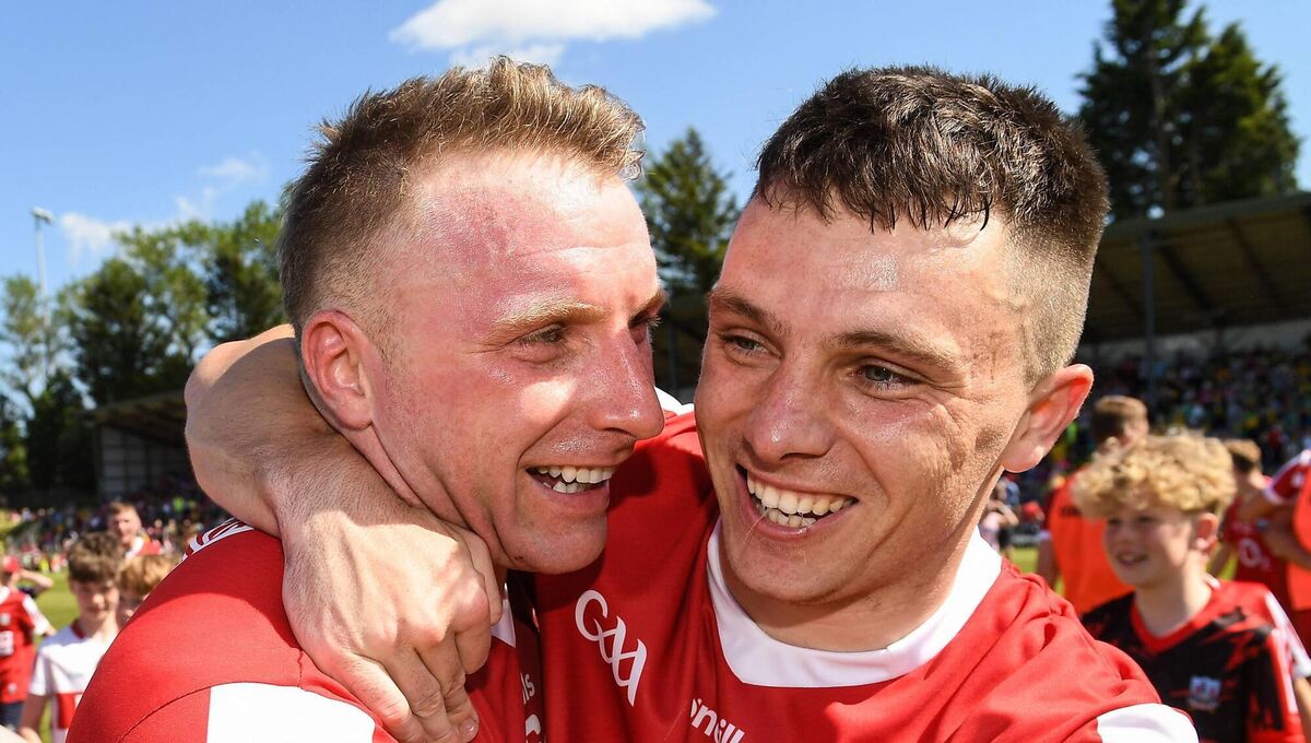 GOOD TIMES: Brian Hurley and Powter celebrate their All-Ireland SFC win over Donegal at Páirc Uí Rinn. Pic: Matt Browne/Sportsfile