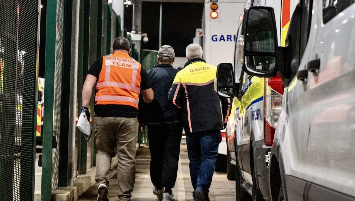 Deportees are escorted through security checks at Dublin Airport during Operation Trench, with garda teams overseeing each step to ensure safety, order, and humane treatment. Picture: Chani Anderson