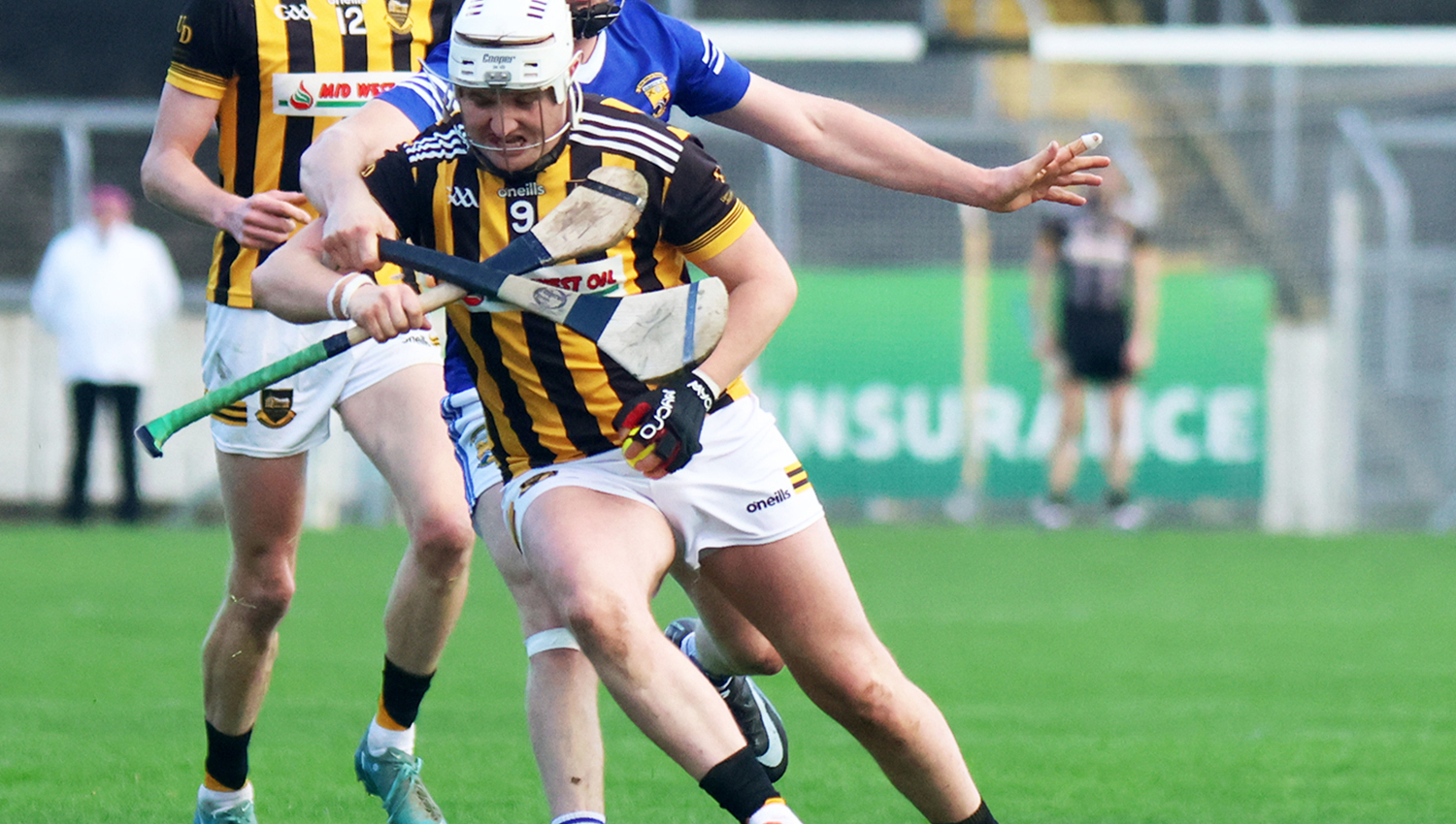 Aaron Ryan, Upperchurch Drombane, in possession against James O'Callaghan, Ballinhassig in the AIB Munster GAA Hurling Intermediate Club Championship semi-final at Semple Stadium