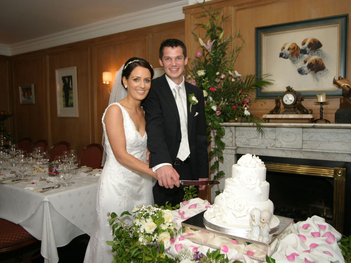 Sarah Louise Dunne and her husband Cormac cut the cake