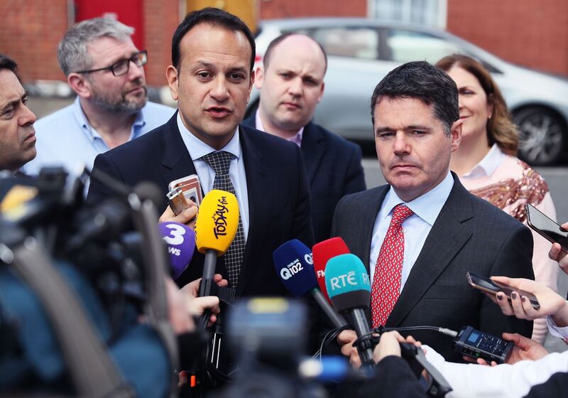 Then social protection minister Leo Varadkar and public expenditure minister Paschal Donohoe speaking to media on Friday May 19, 2017, when Mr Donohoe backed his fellow Dubliner to lead Fine Gael. Picture: Brian Lawless/PA