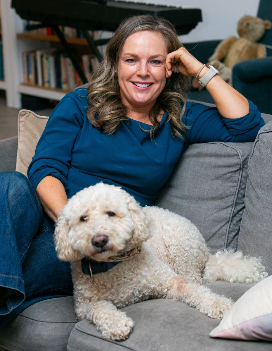 Author Julia Kelly with her dog Sunny at her home in Dun Laoghaire, Dublin. Picture: Gareth Chaney