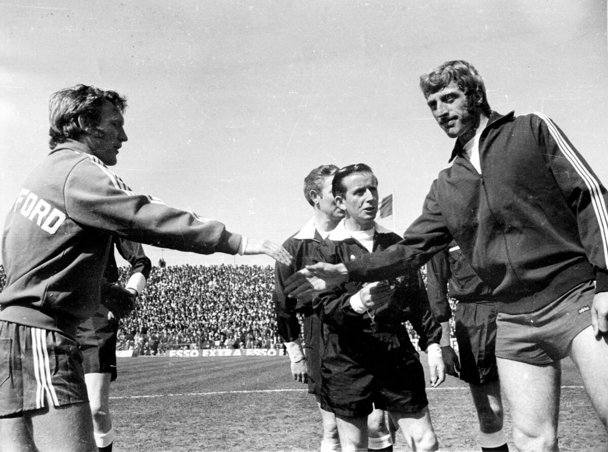 Alfie Hale, Waterford and Dave Bacuzzi, Cork Hibernians (right) shake hands prior to the 1972 FAI Cup Final at Dalymount Park, Dublin. In the centre is Charlie O'Leary, referee.Cork Hibs Soccer Football League of Ireland