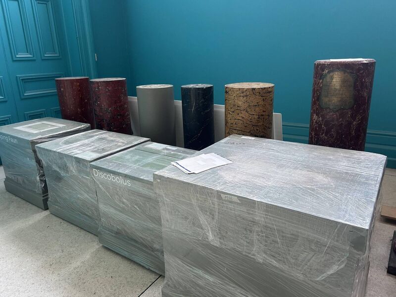 Empty plinths and packed boxes at the Crawford. 