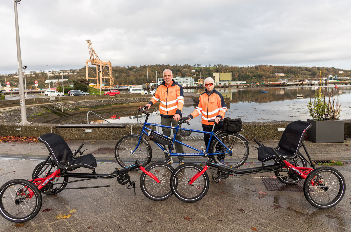  Mark O’Donoghue of Cycling For All Cork and Anne Kelliher with the tandem and other bicycles that people with disabilities can use. Picture: David Creedon
