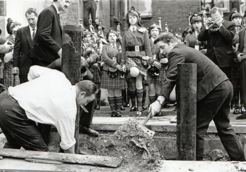 'Gravediggers' digging up Mick Meaney's coffin in a builder's yard in Kilburn, North London, in 1968. 