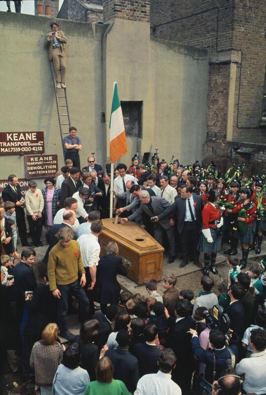 Police had to hold back the crush of people as Mick Meaney — attended by a London-Irish pipe band and a gaggle of journalists eager to interview him — was exhumed in Kilburn, London. Picture: Bettmann Archive/Getty