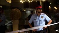 One injured in Barcelona shooting; police hunt gunman