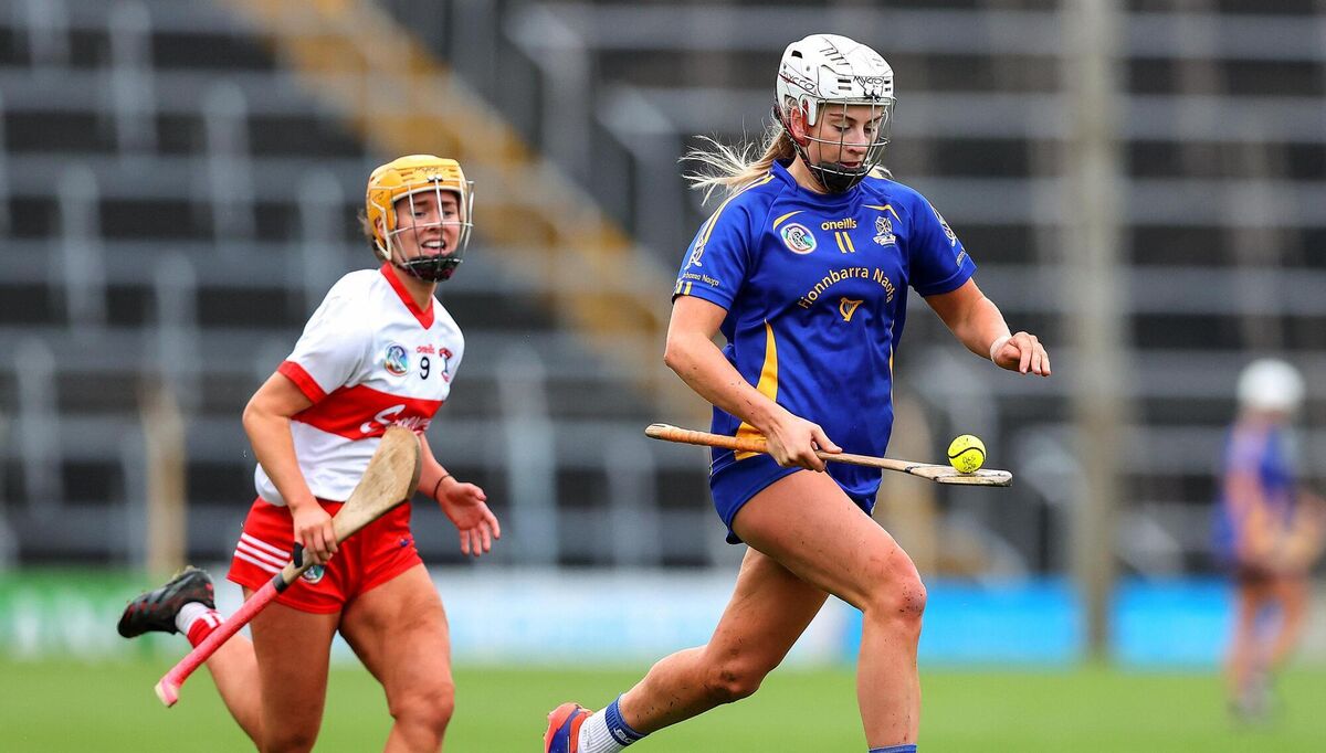 HISTORY MAKERS: St. Finbarrs Kate Wall with De La Salle's Leah Browne. Pic: ©INPHO/Tom O'Hanlon.
