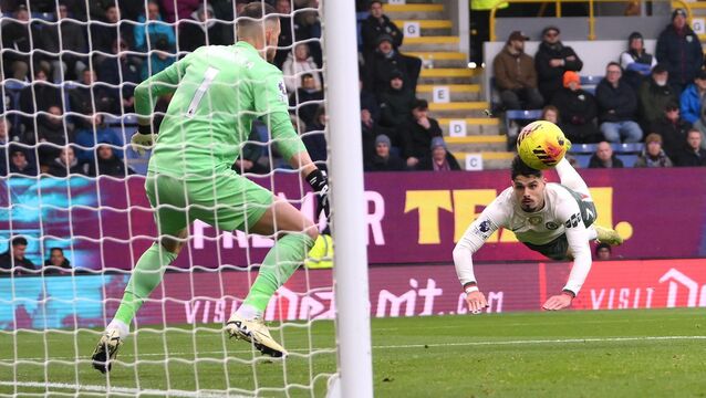 <p>Pedro Neto, right, scores with a diving header (Gary Oakley/PA)</p>