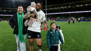 <p>Ireland's Bundee Aki with his family after the defeat by South Africa. Pic ©INPHO/Dan Sheridan</p>