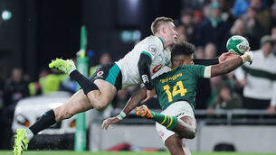 <p>Ireland’s Jack Crowley prevents a try from South Africa’s Canan Moodie. Pic: ©INPHO/Gary Carr</p>