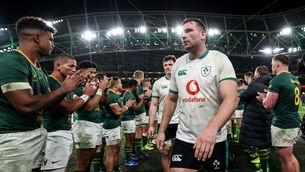 <p>Ireland's Tadhg Beirne walks through the South Africa guard of honour after defeat to the Springboks. Pic: ©INPHO/Dan Sheridan</p>