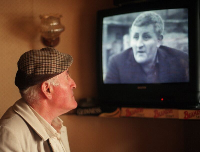 Michael Meaney photographed in 1998 looking at TV coverage of his feat 30 from years previously. That archive film is blended with contemporary footage in the new documentary. Irish Examiner Archive: Richard Mills
