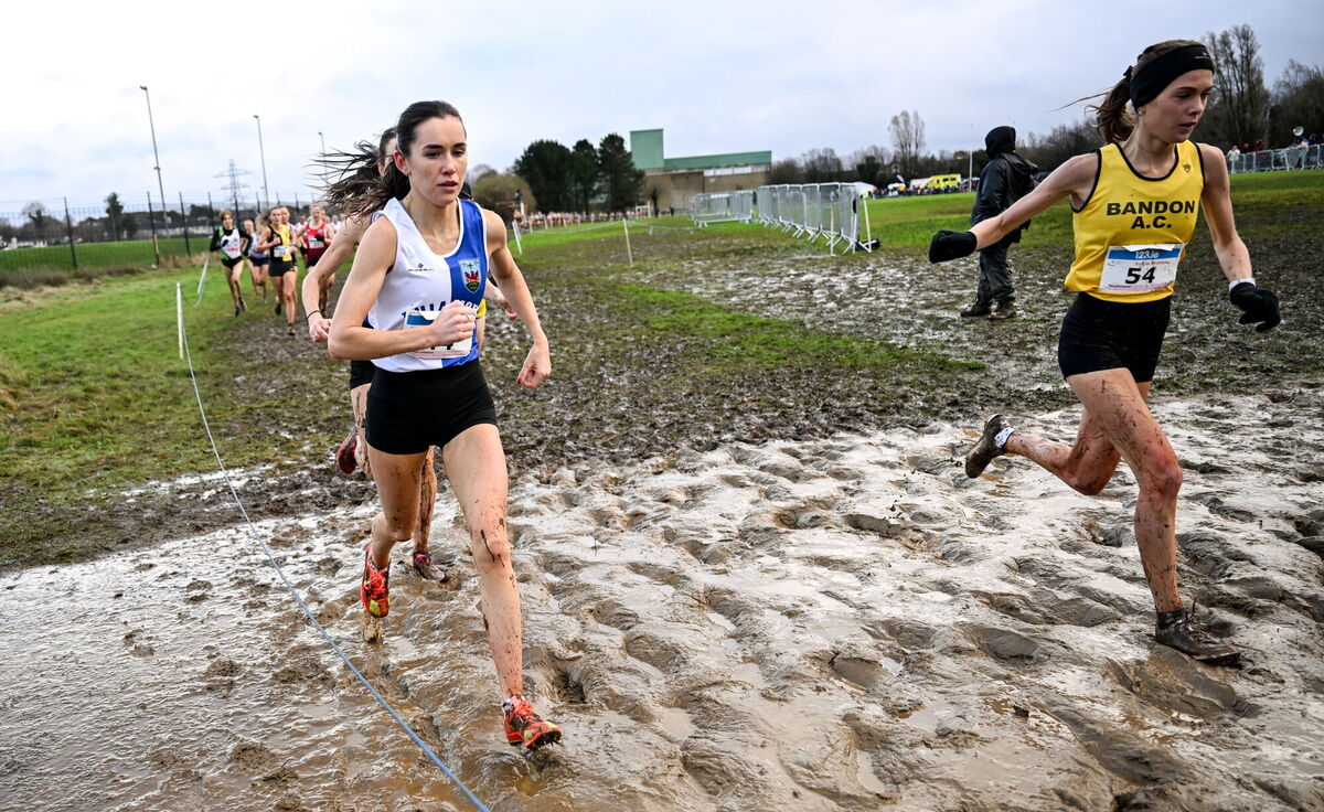 Danielle Donegan of Tullamore Harriers AC, Offaly, left, and Fiona Everard of Bandon AC, Cork, compete in the senior women's 7500m. Pic: Ramsey Cardy/Sportsfile.
