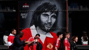 <p>A mural which features George Best at Old Trafford  (Photo by Michael Steele/Getty Images)</p>