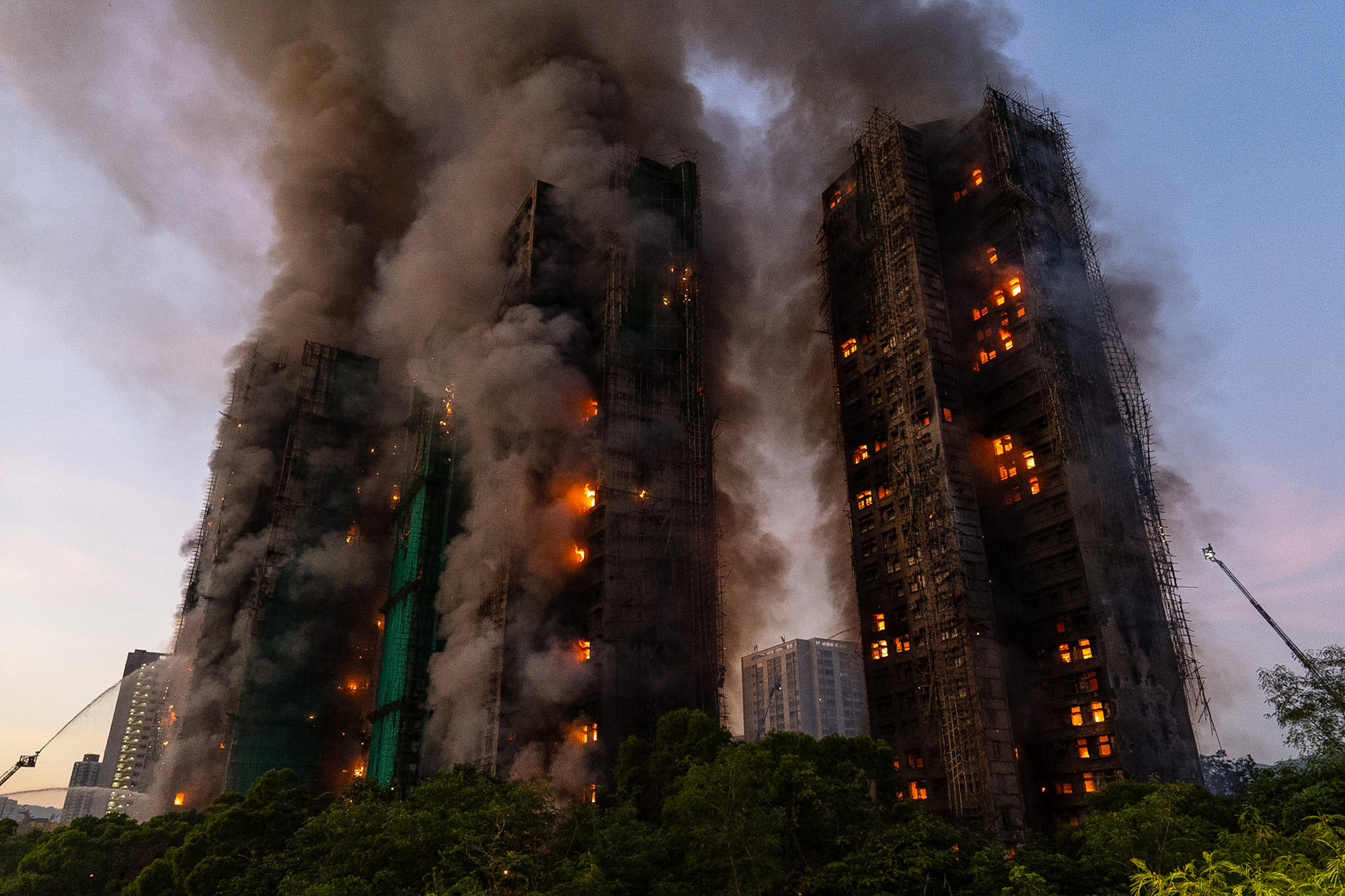 Four dead as fire rages through Hong Kong high-rise residential complex