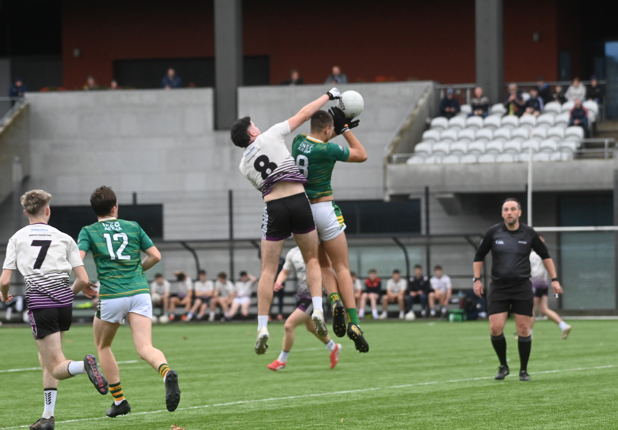  Paddy Collins, Skibbereen and Mark Kennelly, St Brendan's College challenge for possession in the air. Corn Uí Mhuiri football - St Brendan's College v Skibbereen at SuperValu Páirc Uí Chaoimh 4G. Picture: Larry Cummins