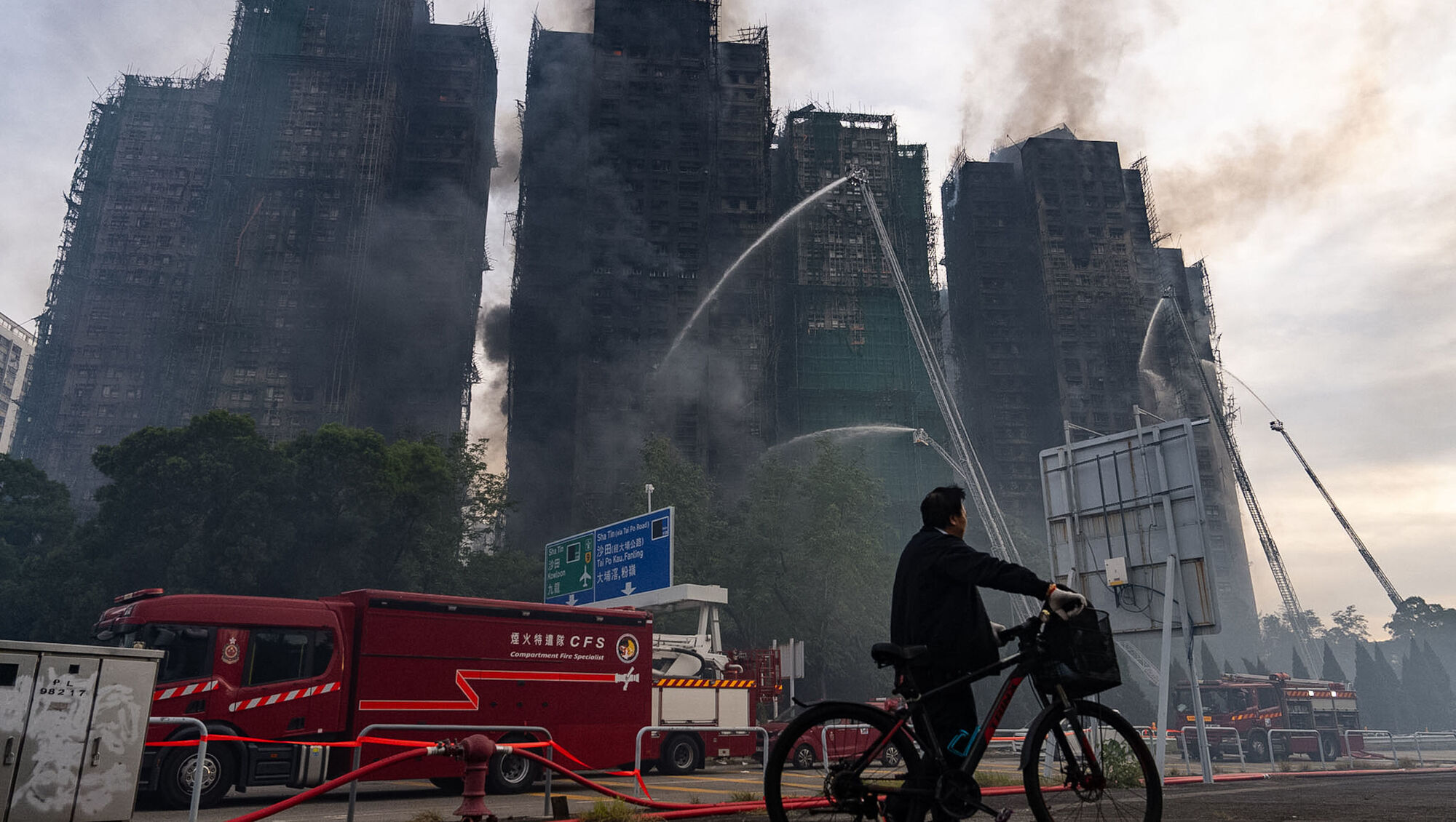 Rescue efforts end at Hong Kong tower block fire as death toll reaches 128