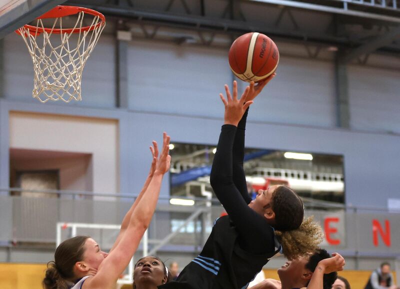  Jewel Watkins of UCC Glanmire shoots for a rebound. Picture: Jim Coughlan