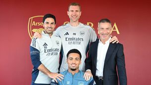 <p>IN THE BAG: Ethan Nwaneri is another of Arsenal's Academy graduates to sign a long-term contract with the club. He's pictured with manager Mikel Arteta, Mertesacker and Andrea Berta, the club's director of football. Pic: Getty</p>