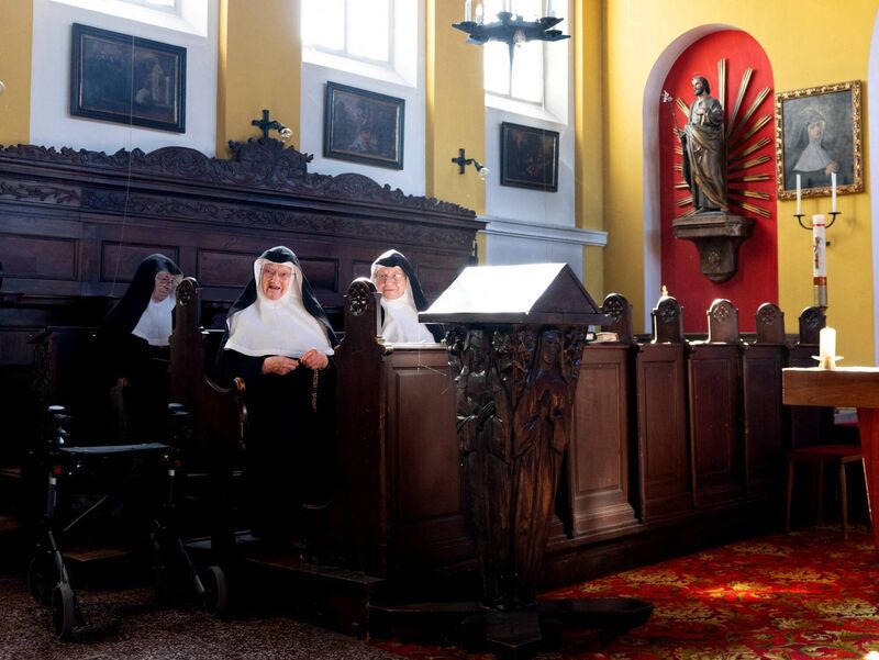 Sisters Regina, 86, Bernadette, 88, and Rita, 81, at a special Mass with over a dozen supporters and former students at the convent chapel after they had moved back into the convent at Schloss Goldenstein in Elsbethen, near Salzburg, Austria. Picture: Joe Klamar/AFP/Getty