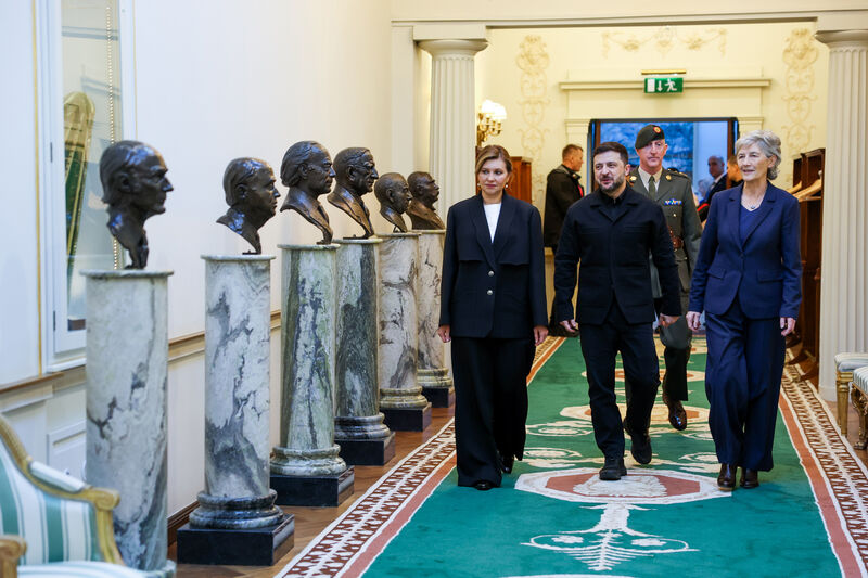 First Lady Olena Zelenska and President of Ukraine Volodymyr Zelensky on a courtesy call with Uachtarán na hÉireann Catherine Connolly at Áras an Uachtaráin as they make their way down the Francini Corridor to sign the Visitors Book. Picture: Tony Maxwell