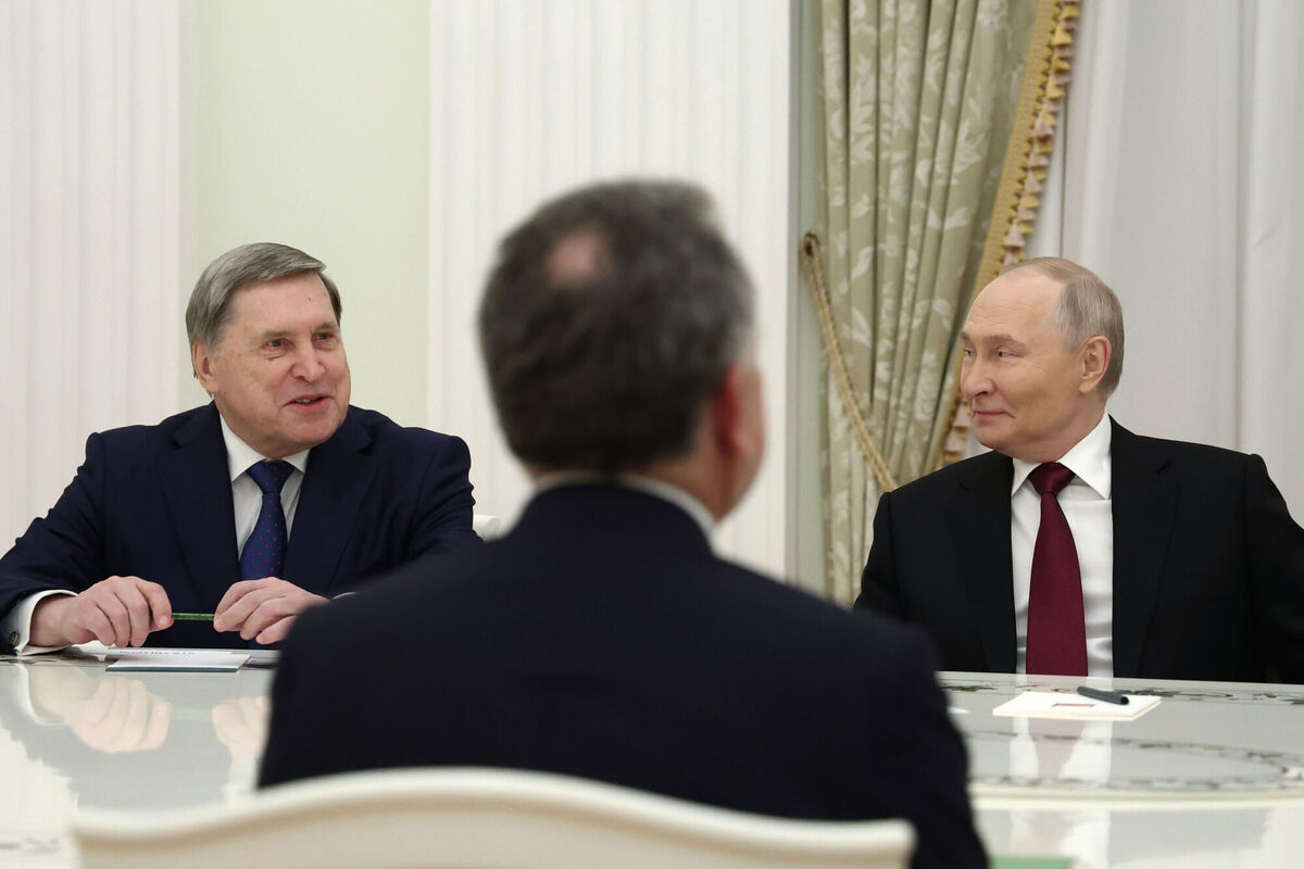 Russian President Vladimir Putin, right, and Russian Presidential foreign policy adviser Yuri Ushakov, left, attend talks with U.S. special envoy Steve Witkoff, back to a camera, at the Senate Palace of the Kremlin in Moscow, Russia, TPicture: Alexander Kazakov, Sputnik, Kremlin Pool Photo via AP