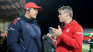 <p>Munster head coach Clayton McMillan with Bath head of rugby Johann van Graan. Pic: Dan Sheridan</p>