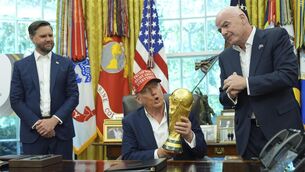 <p>MADE FOR EACH OTHER: President Donald Trump holds the FIFA World Cup Winners Trophy as FIFA President Gianni Infantino, right, and Vice President JD Vance watch, during an announcement in the Oval Office of the White House, Friday, Aug. 22, 2025, in Washington. (AP Photo/Jacquelyn Martin)</p>