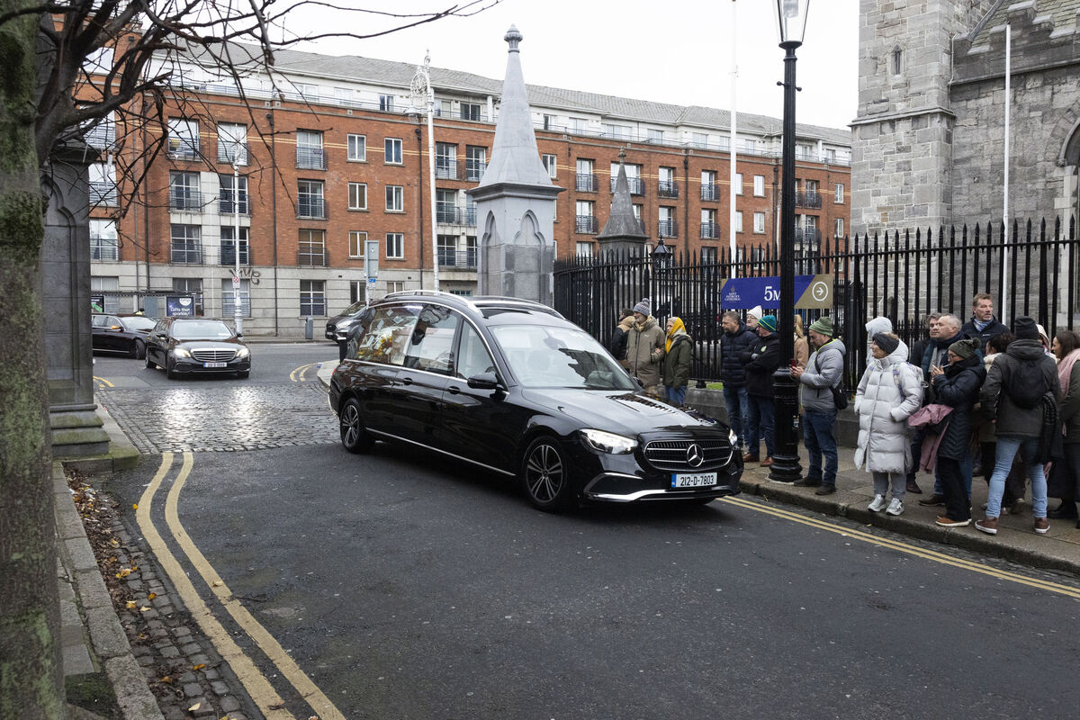 The cortege arrives for the funeral of tv personality and architect Hugh Wallace who passed away unexpectedly at home on December 1. Pictures: SAM BOAL/Collins Photos