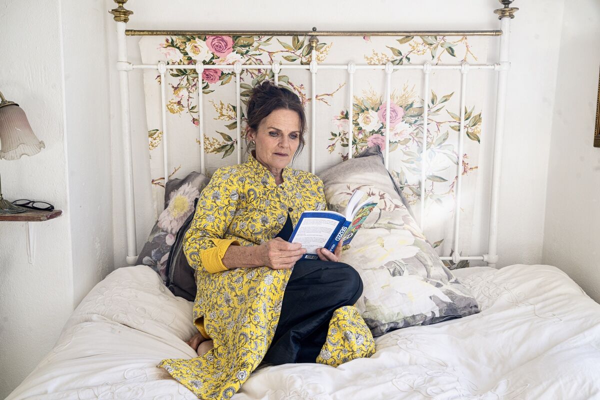 Aida Austin reads on her bed—the very place she wrote Seized—a quiet refuge during years of navigating Iona’s complex epilepsy. “Writing became a way to compartmentalise what felt overwhelming.” Picture Chani Anderson. Aida Austin reads on her bed—the very place she wrote Seized—a quiet refuge during years of navigating Iona’s complex epilepsy. “Writing became a way to compartmentalise what felt overwhelming.” Picture Chani Anderson.