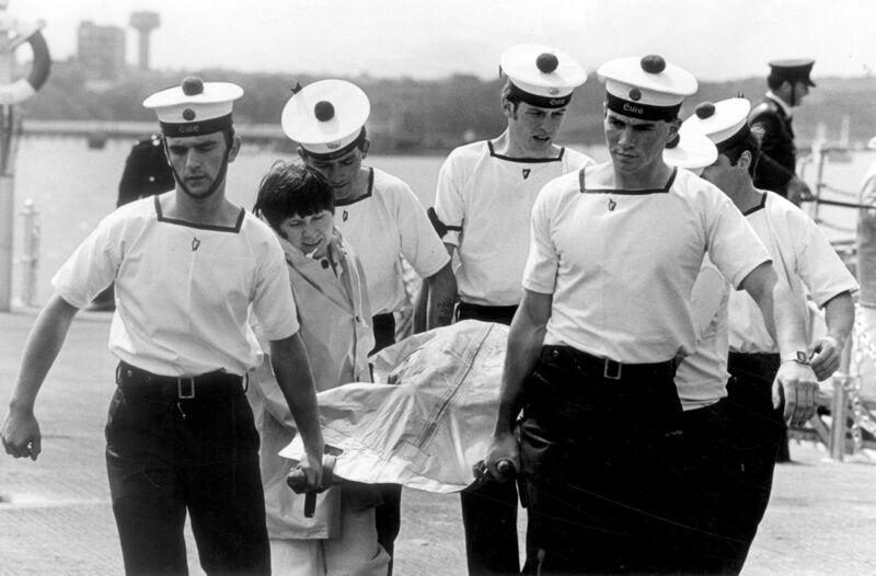 An Irish Examiner Archive photo shows members of the Irish navy carrying the remains of one of the victims of the Air India Flight 182 disaster on June 23, 1985, when a Boeing 747 aircraft was blown up off the south west coast of Ireland, killing all 329 people aboard.