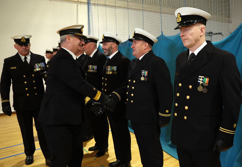  Flag Officer Commanding Naval Service, Commodore Michael Malone shaking hands with Warrant Officer Brian Attridge, during the inspection as part of Cdre Malone's stand down parade in Haulbowline, Cork. Picture: Jim Coughlan